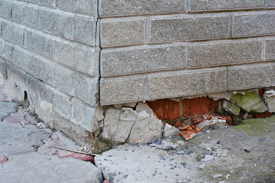 Why Does Brick Damage Keep Showing Up Near the Bottom of My House?